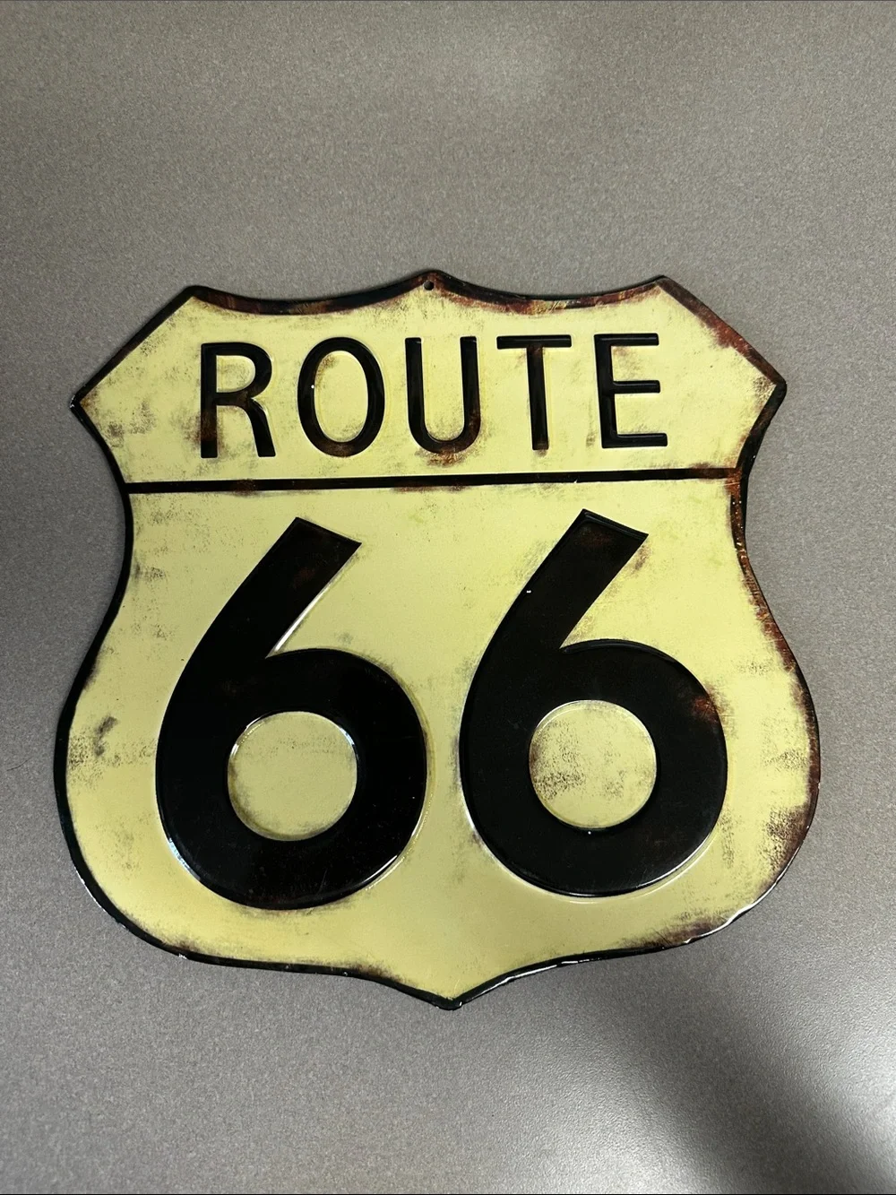 Open Road Brands Route 66 Metal Shield Wall Sign in Yellow and Black